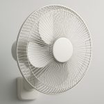 Close-up view of a white wall-mounted drying fan against a plain background